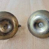 Set of 2 hand candle holders in golden brass