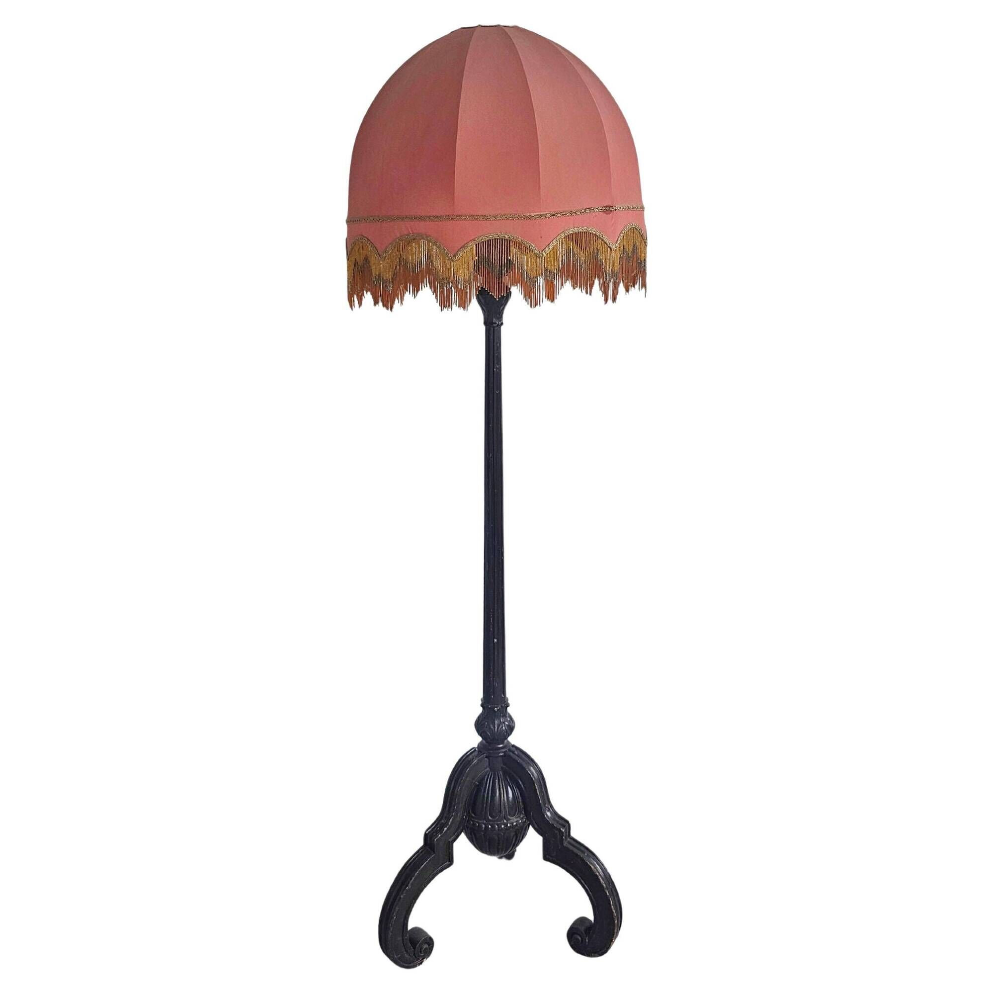 Antique floor lamp in carved oak, Austria late 1890s.