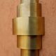 Round Art Deco wall light in brass.