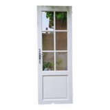 Old wooden door with small squares