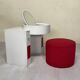 Bathroom toilet with a 70s pouf.
