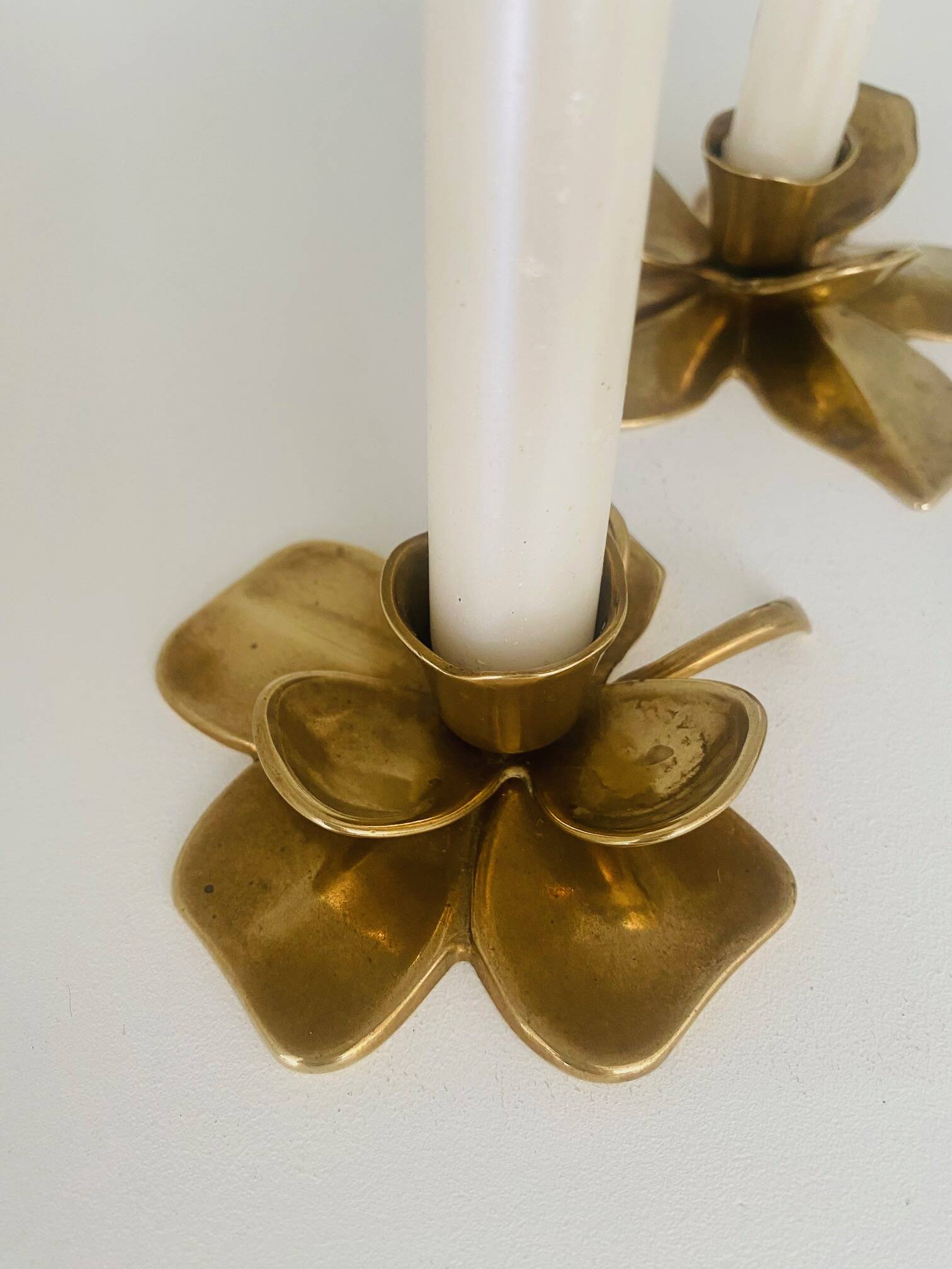 Set of 3 old brass candlesticks in the shape of flowers