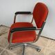 Fauteuil orange à roulettes Eurosit vintage 70’