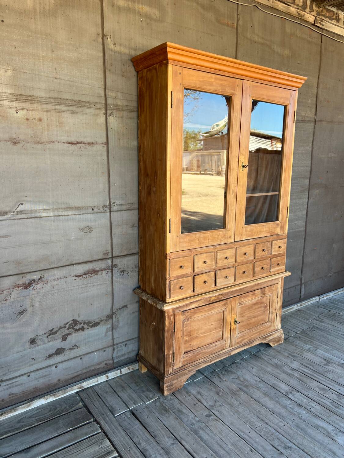 Old display cabinet in raw wood