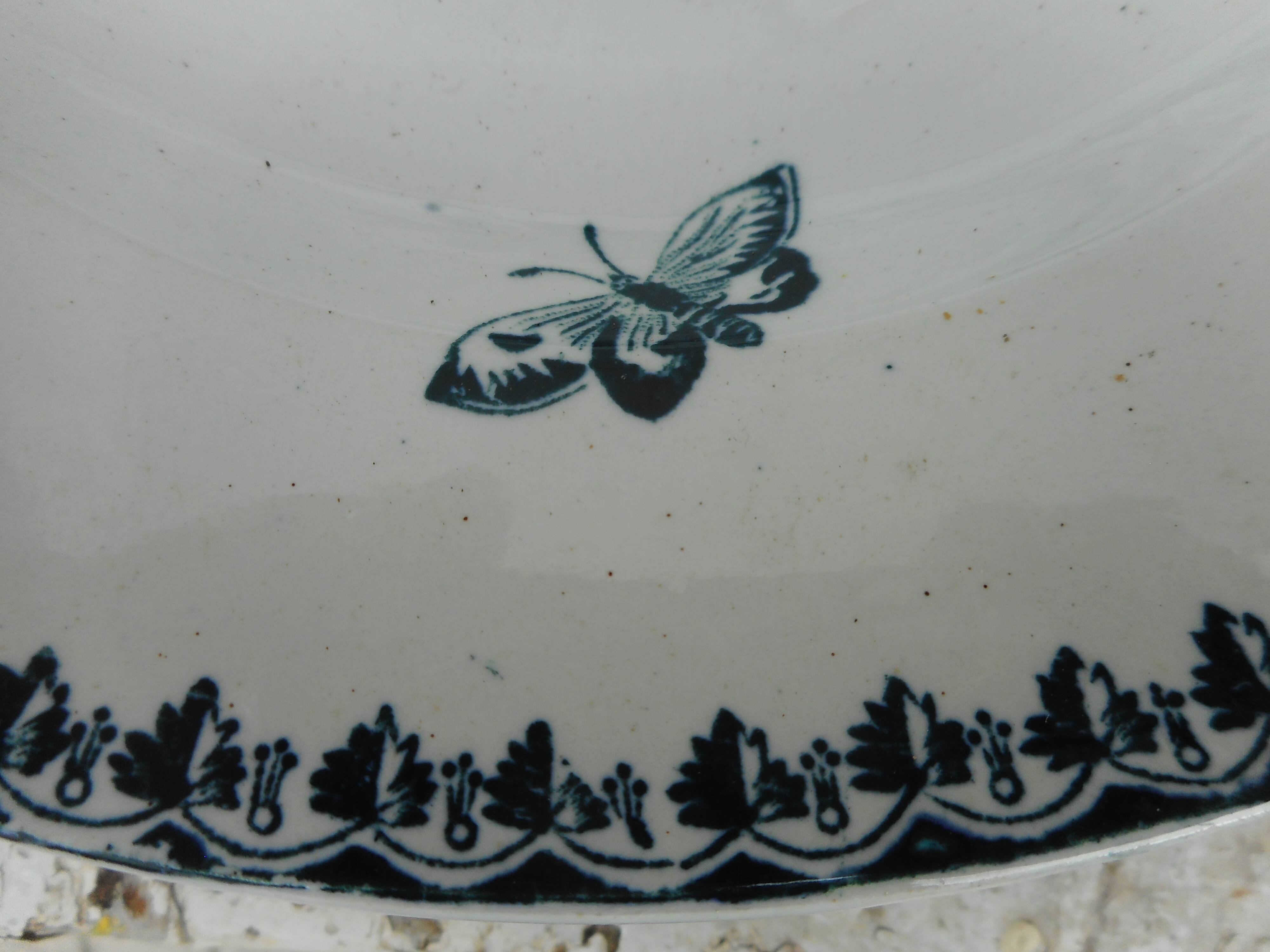 Two hollow plates made of earthenware