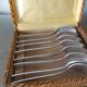 Box of 8 small art deco spoons in silver metal