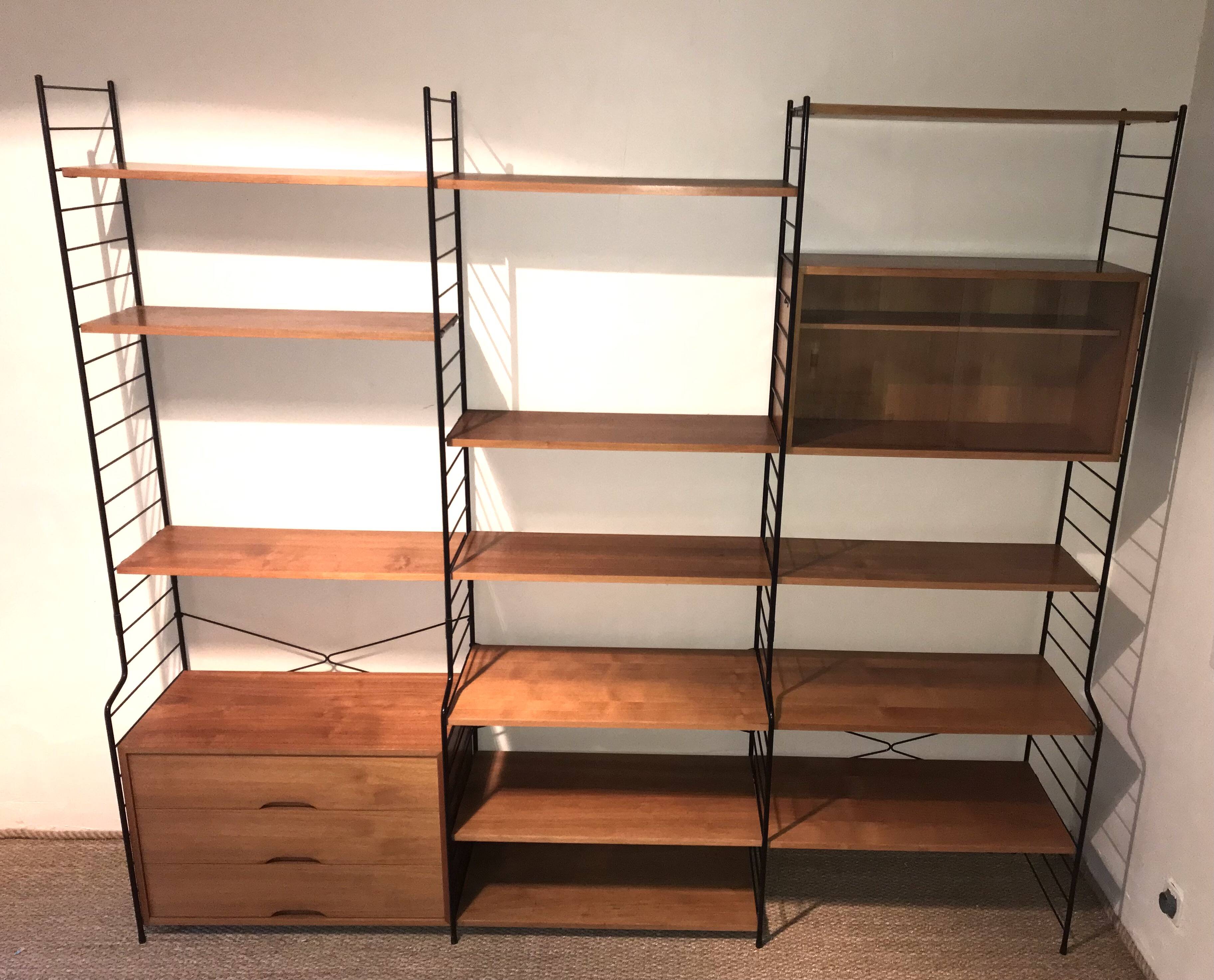 Vintage modular wall-mounted library shelf in blond walnut 1960-80