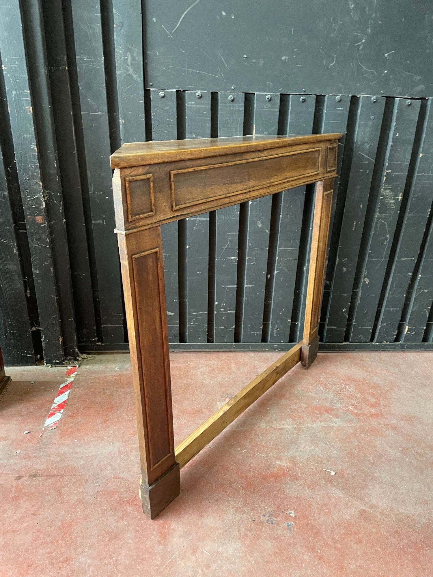 Front or frame or facade of fireplace of the nineteenth century in walnut wood carved by hand.