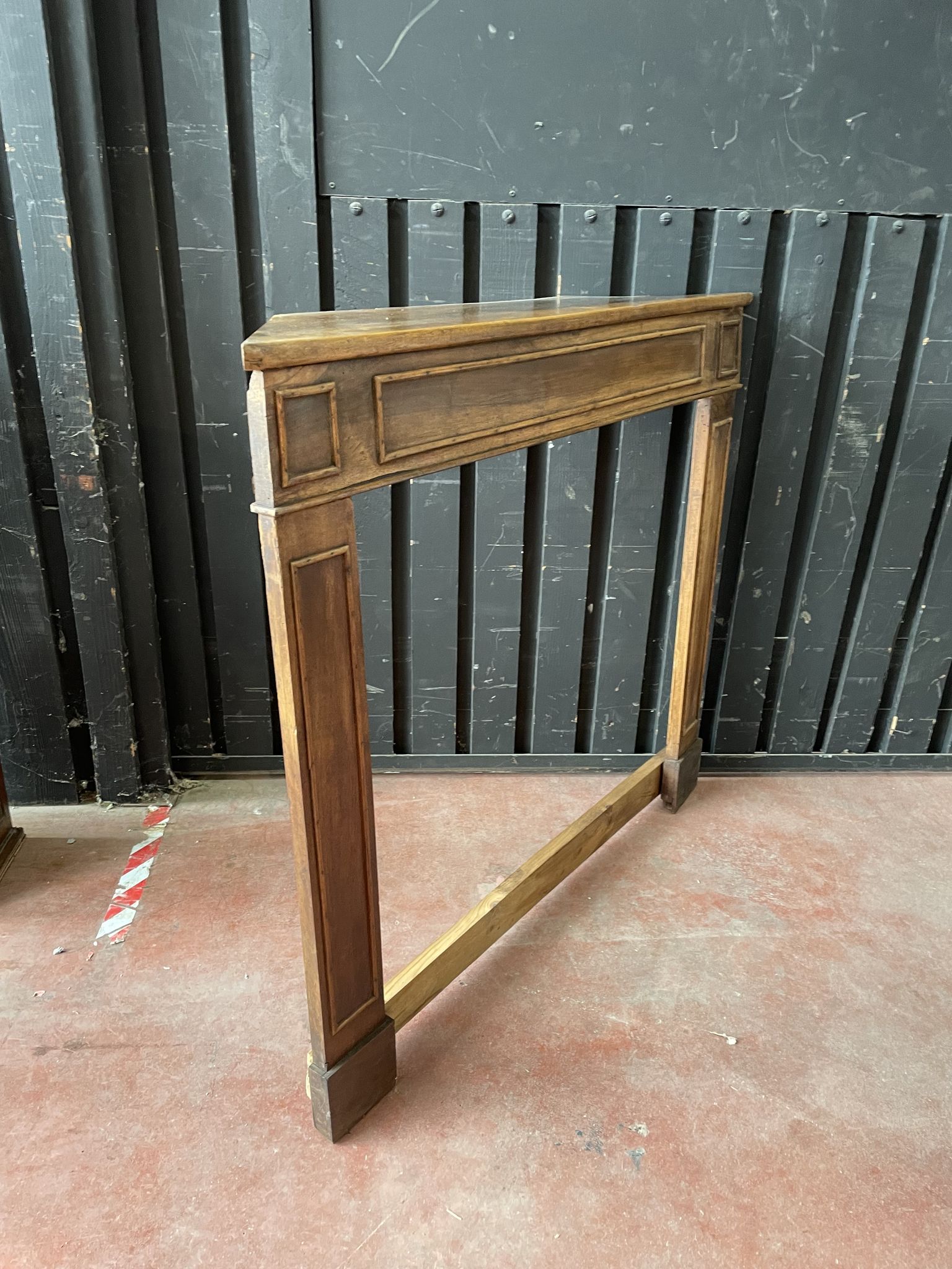 Front or frame or facade of fireplace of the nineteenth century in walnut wood carved by hand.