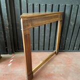 Front or frame or facade of fireplace of the nineteenth century in walnut wood carved by hand.