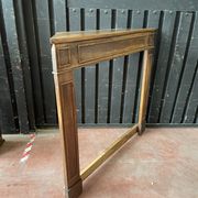 Front or frame or facade of fireplace of the nineteenth century in walnut wood carved by hand.