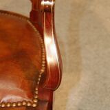 19th century armchair in leather and rosewood inlaid with brass and rosewood