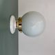 Vintage globe wall or ceiling light in white opaline.