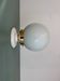 Vintage globe wall or ceiling light in white opaline.