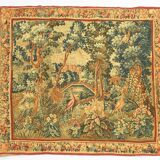 Printed green tapestry depicting birds in the park of a castle