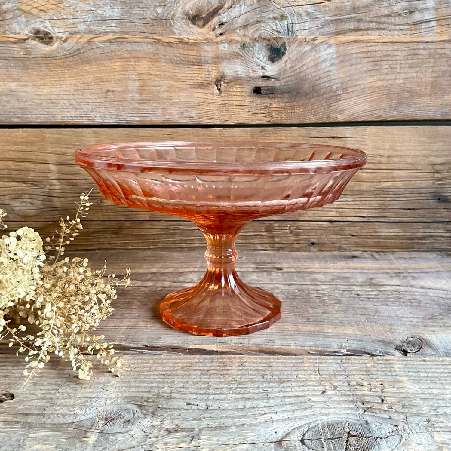 Pink glass cup, fruit bowl