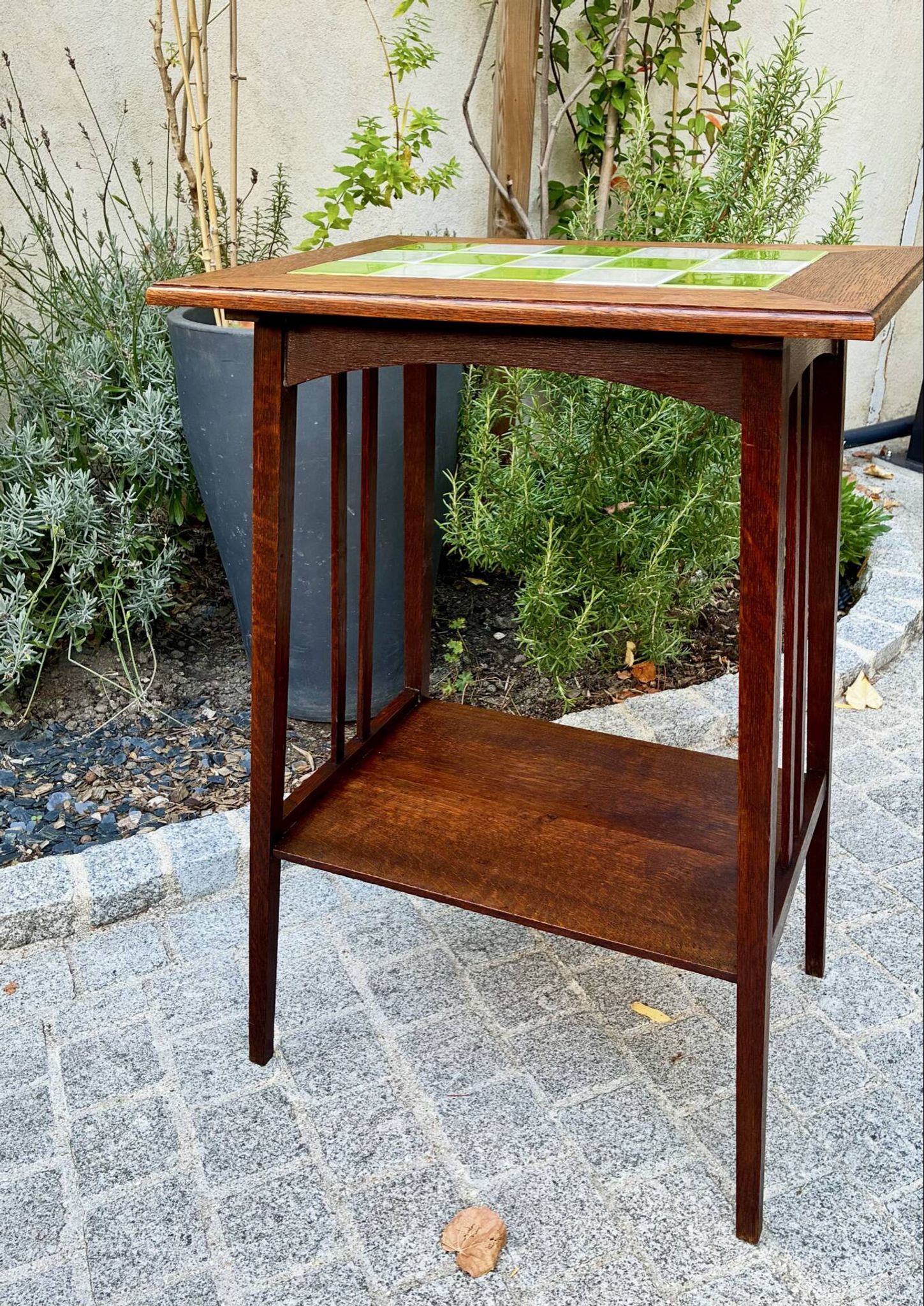 Art Nouveau side table 1910 with double tops in dark oak.