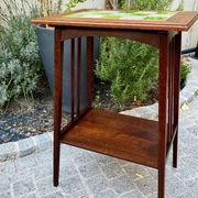 Art Nouveau side table 1910 with double tops in dark oak.