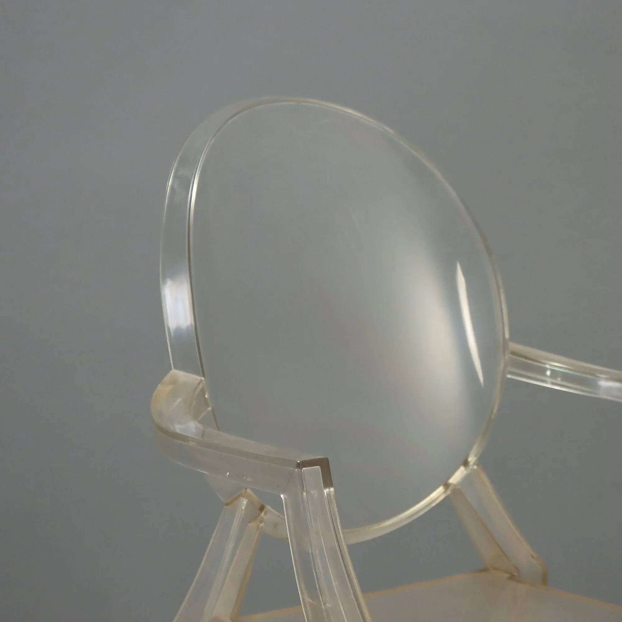 Louis Ghost chairs by Kartell designed by Philippe Starck from the 2000s.