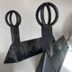 Paire de chenets modernistes mid century en fonte