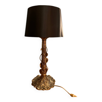 Brass foot table lamp with Tiffany style decor