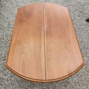 Table ovale 6 pieds avec allonges patine caramel