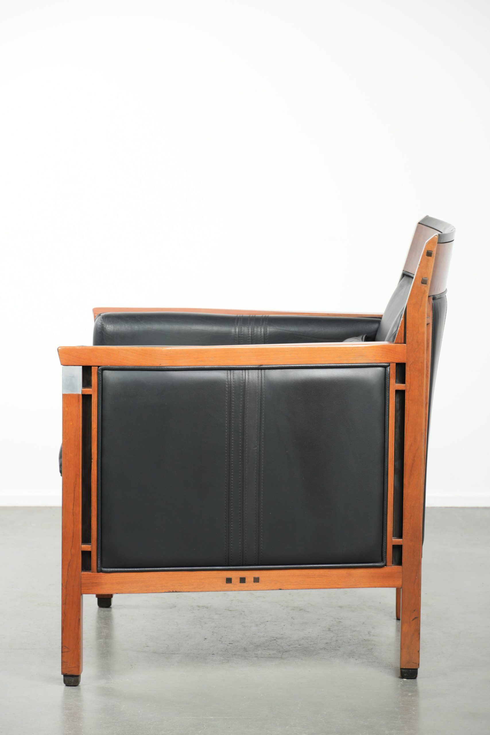 Black leather Art Deco design armchair in good condition