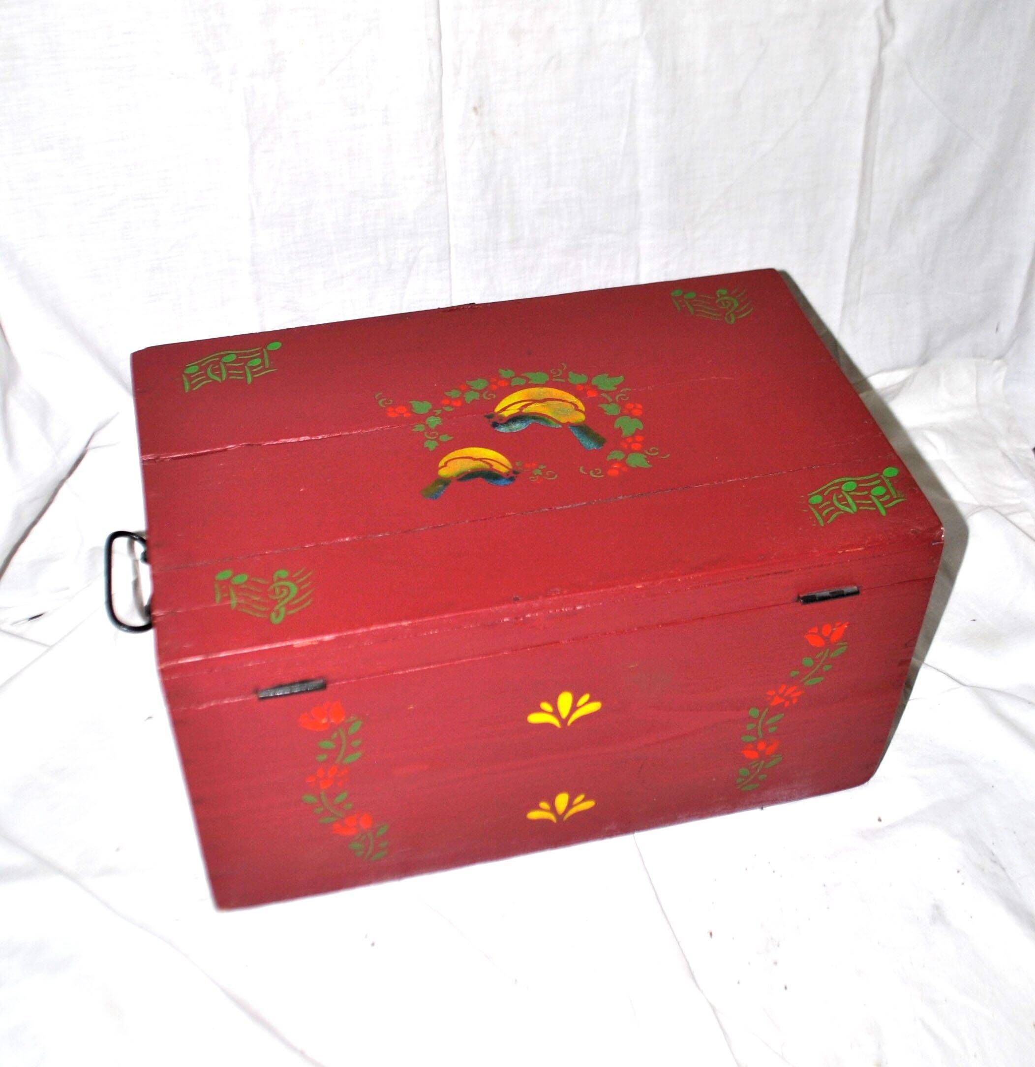 Vintage wooden trunk – toy chest or music box with painted stencil bird decoration.