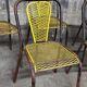 Six chaises en métal perforé seducta René Malaval