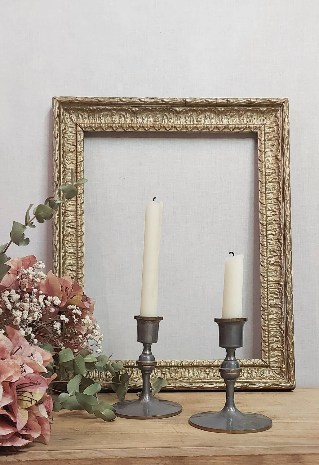 Pair of pewter candle holders