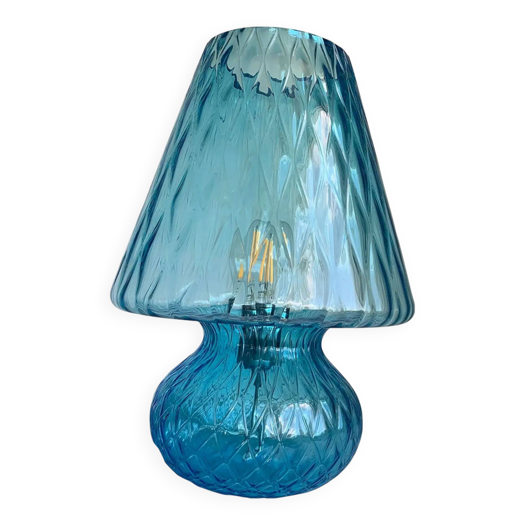 Light blue Murano-style glass with a balloton lamp.