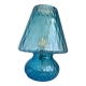 Light blue Murano-style glass with a balloton lamp.