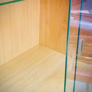 Double display case mounted at an angle with doors from the Capelle 60' house in Montauban