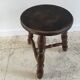 Tabouret en bois tourné tripode vintage