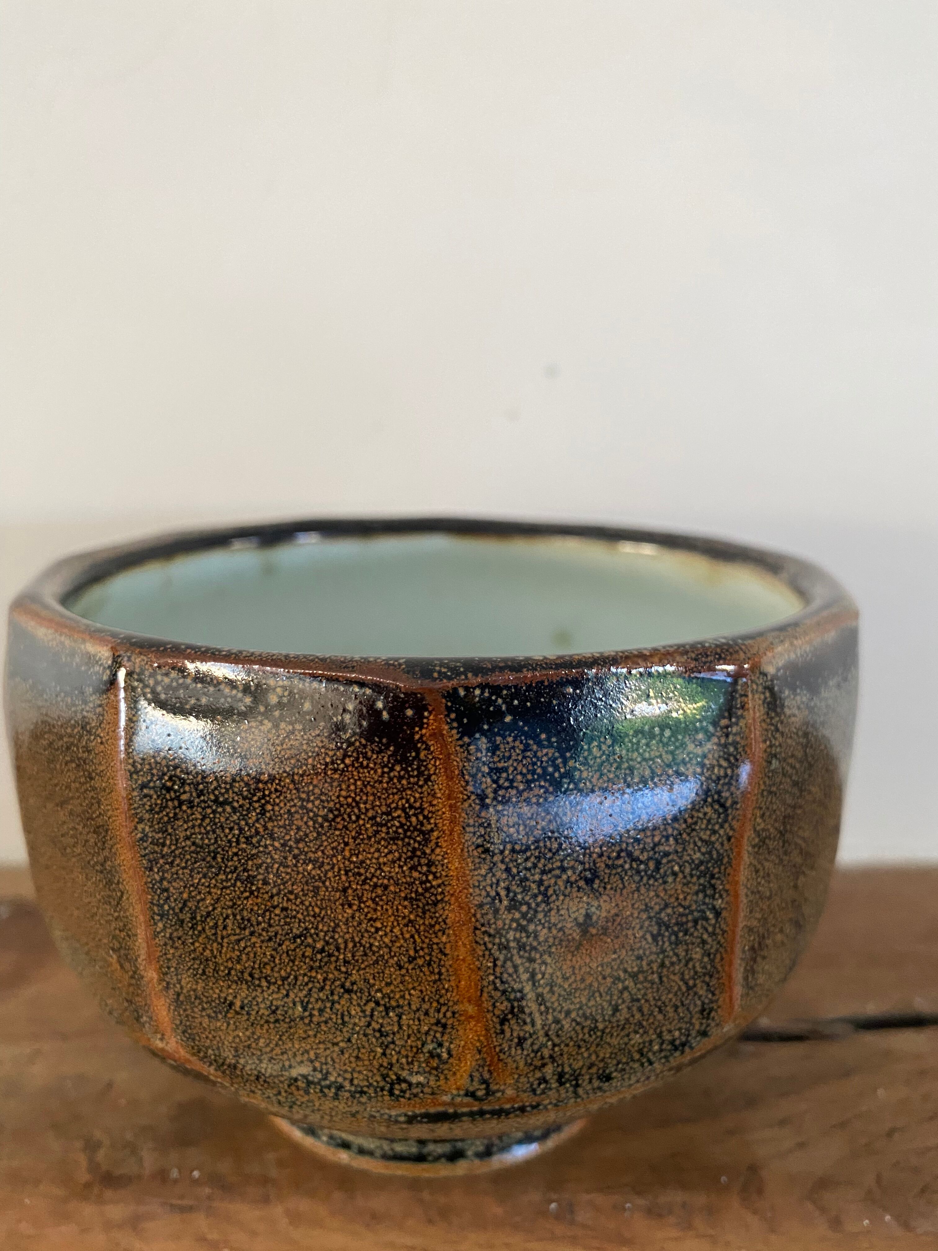 Glazed ceramic bowl signed