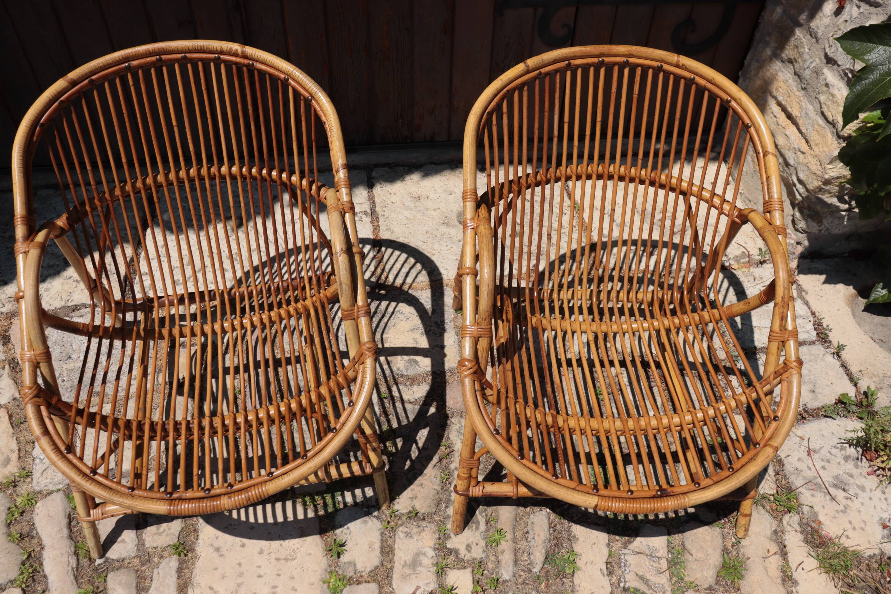 Pair of rattan armchairs Audoux-Minnet style