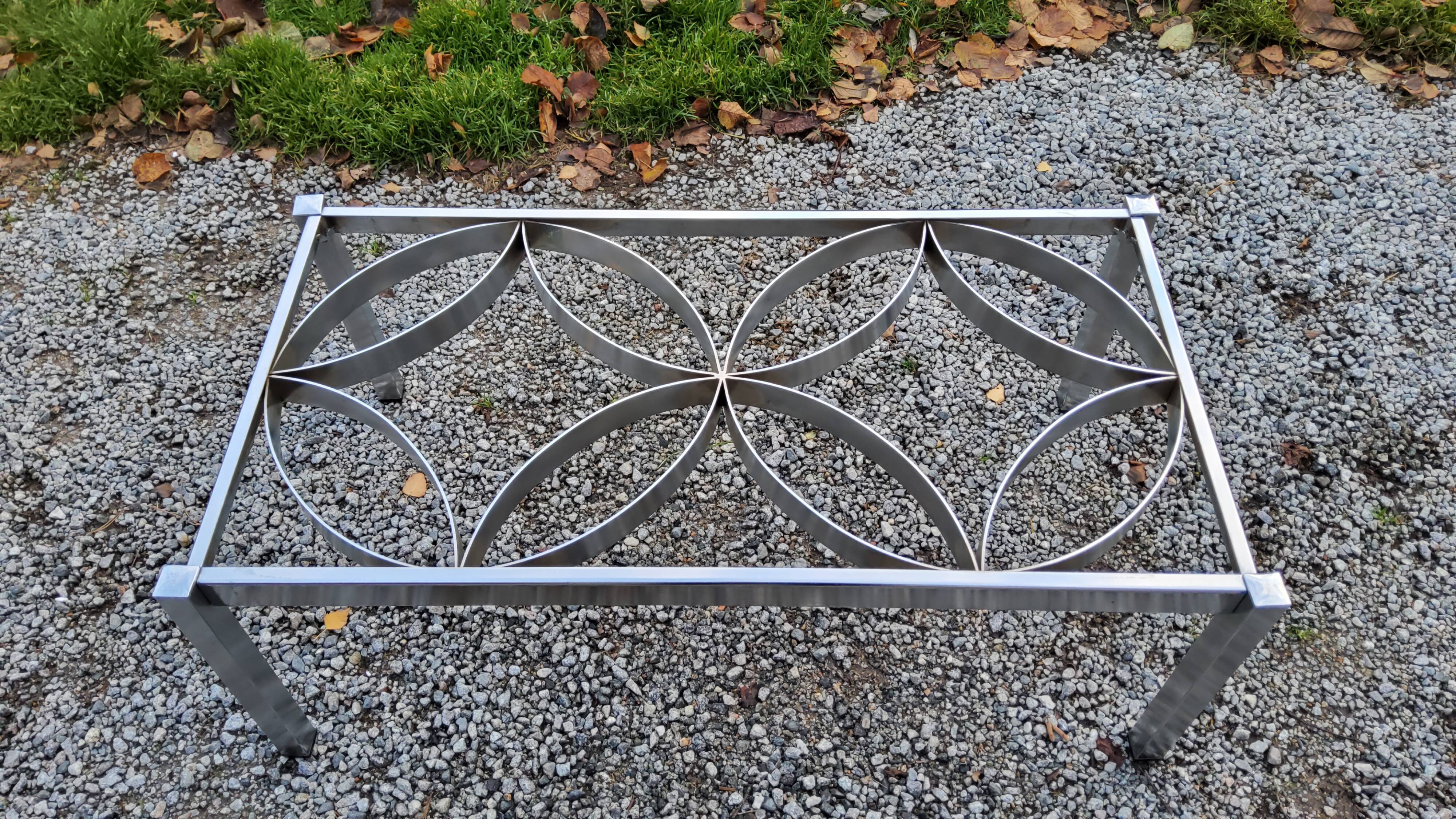 Coffee table from the 70s chrome and smoked glass