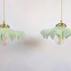 Pair of green opaline glass pendant lights – frosted poetry & Art Deco brilliance