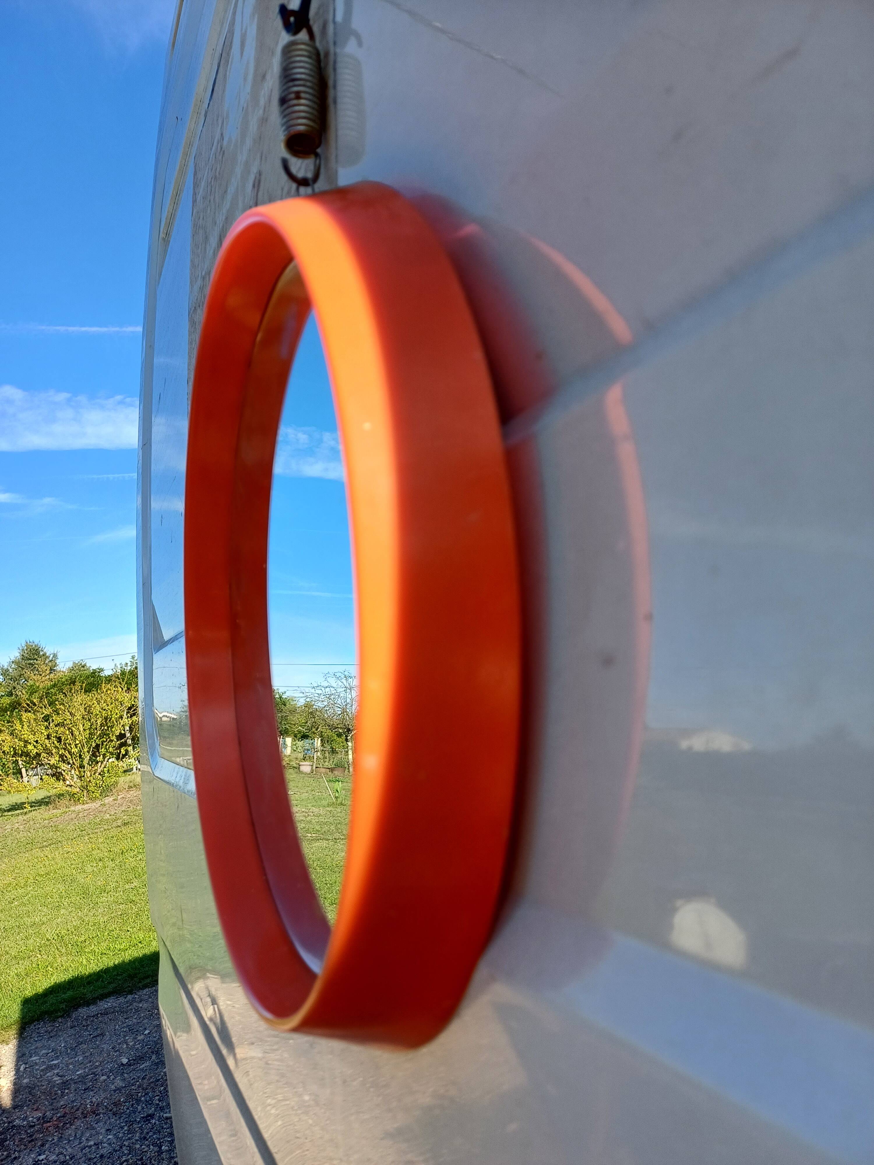 Vintage round plastic orange mirror