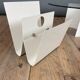 White lacquered metal magazine rack from the 1970s