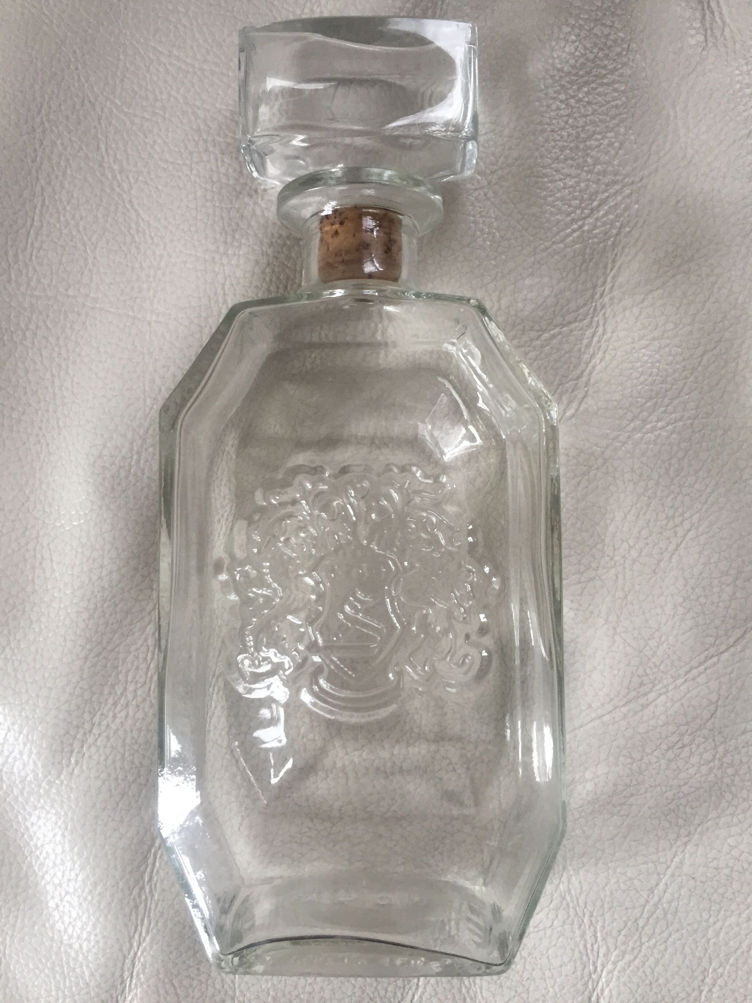 Glass bottle with coat of arms