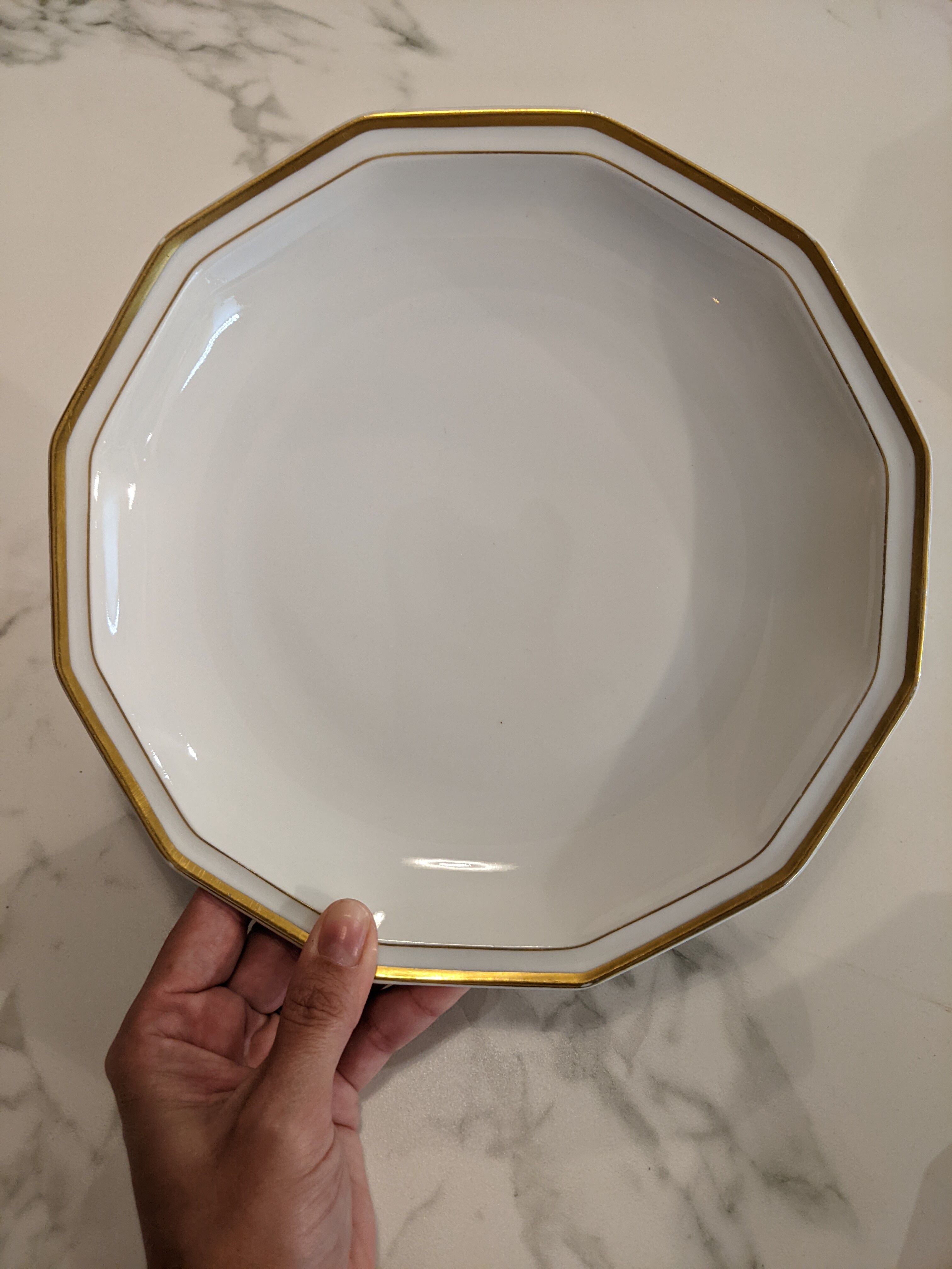 Set of vintage hollow plates in white and gilded Limoges porcelain