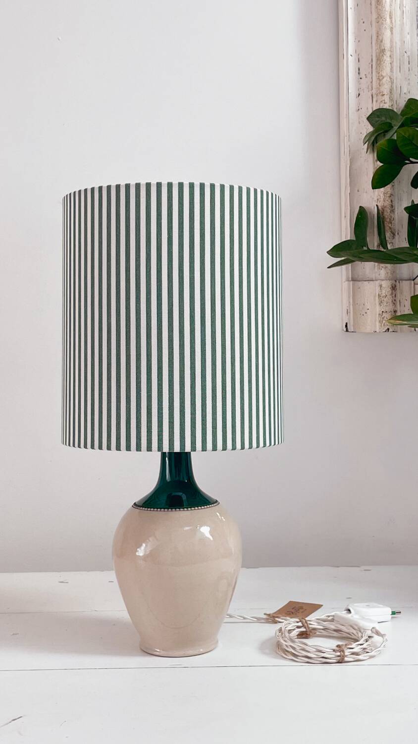 Sandstone lamp and striped lampshade