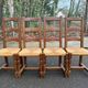 4 dining chairs made of solid wood with straw seats, farmhouse style, medium oak, 20th century, 110cm.