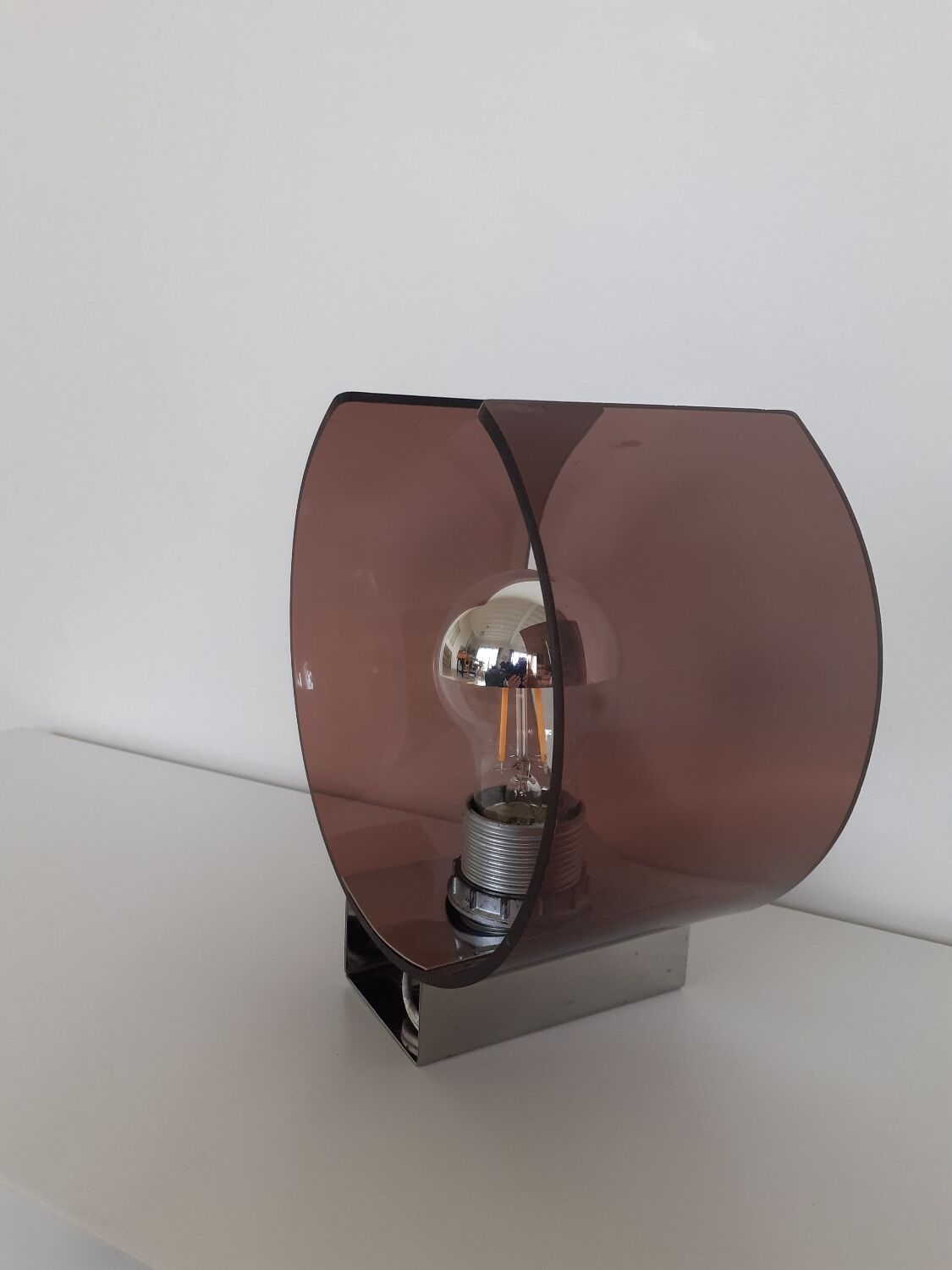 Space age plexiglass wall light.