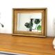 Antique mirror in gilded and copper wood