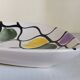 Three vintage free-form ceramic ravine dishes from the 1950s