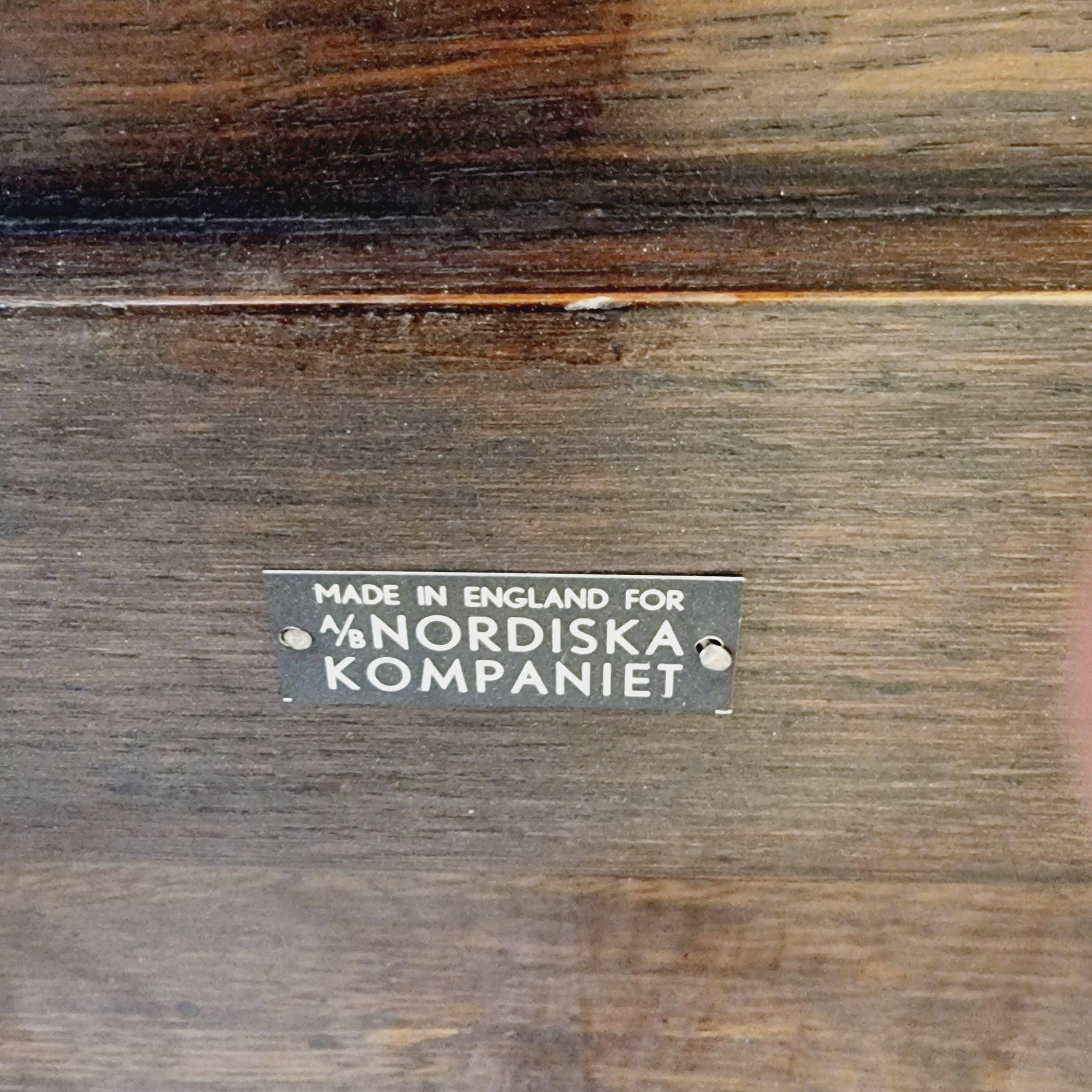 Nordiska Kompaniet coffee table, made in England for NK, mid-1900s.