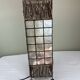 Capiz shell lamp and woven twigs