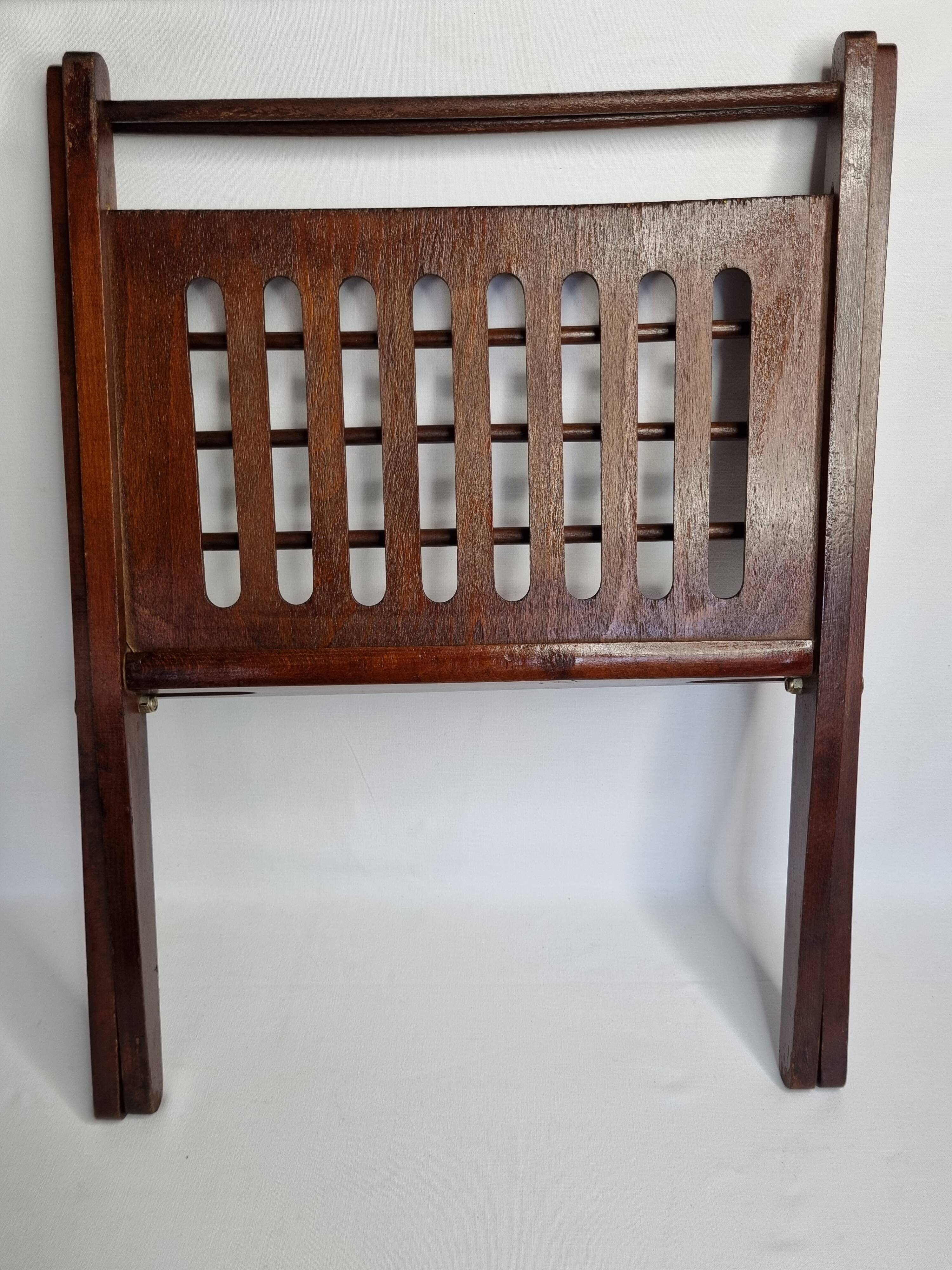 Folding teak magazine holder by Cees Braakman